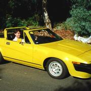 Bob in yellow sports car